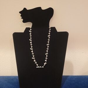 Designed by Monet, this vintage necklace is timeless elegance.